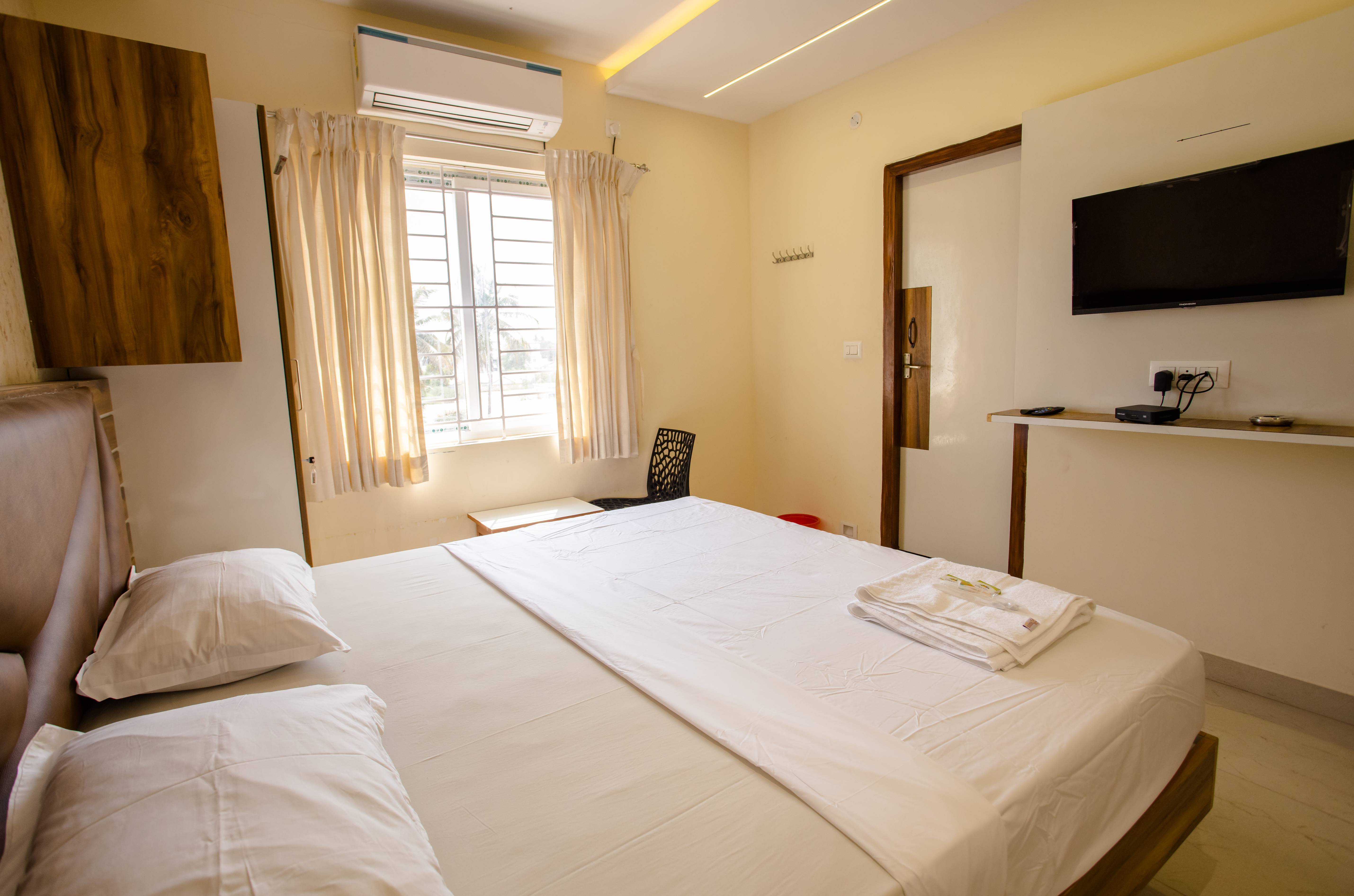 PARVA RESIDENCY | Premium Room with AC